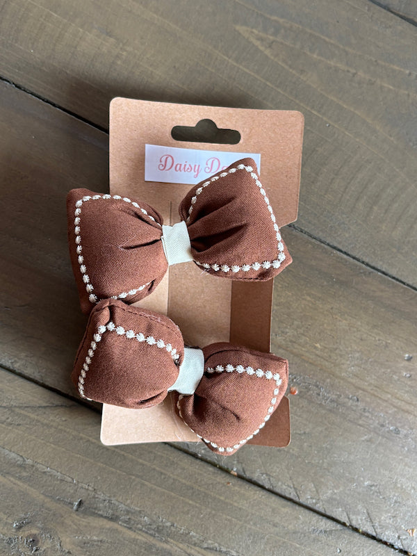 Brown and cream cushion bow bobble