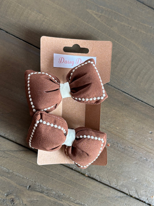 Brown and cream cushion bow bobble